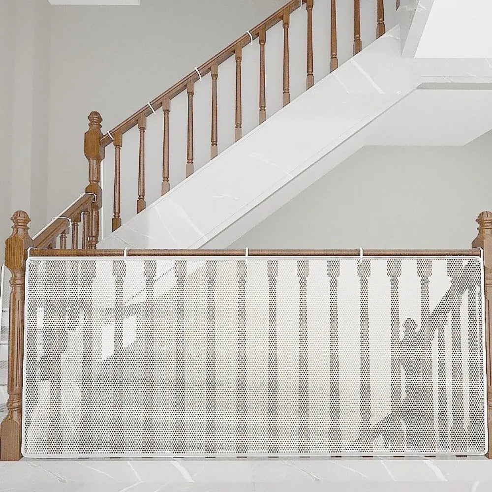 A white mesh safety net installed on a wooden railing for balcony or stairs.