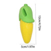 A bright green carrot corn design squeaky chew toy for dogs shown from the side.
