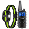 Black waterproof dog training collar with a green strap and a remote control device