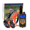 A black remote dog training collar with an orange strap and LCD display is shown in front of its packaging.
