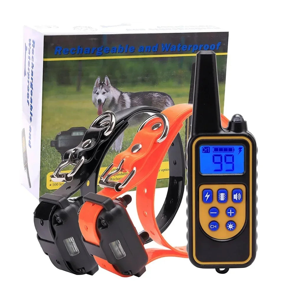 A black remote dog training collar with an orange strap and LCD display is shown in front of its packaging.