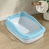A light blue high-sided cat litter box with a white interior and anti-splash design shown on a wooden floor.