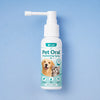 A white pump bottle of Pet Oral Freshening Spray for dogs and cats against a light blue background.
