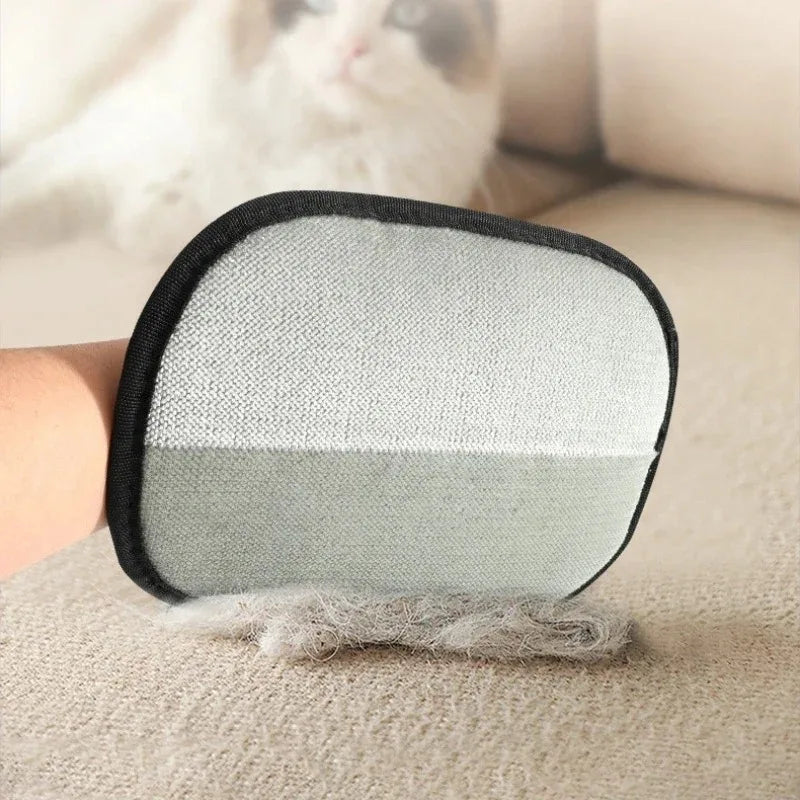 A pair of double-sided pet grooming gloves for cats and dogs, showing a gray and black padded surface.