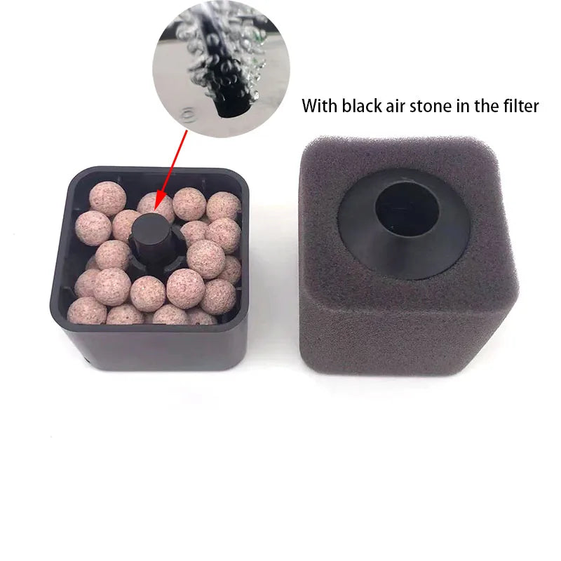 A black sponge filter is shown with black air stones inside the filter and a separate gray filter housing.