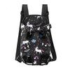 Black fabric backpack carrier featuring various animal silhouettes like cats and dogs for travel