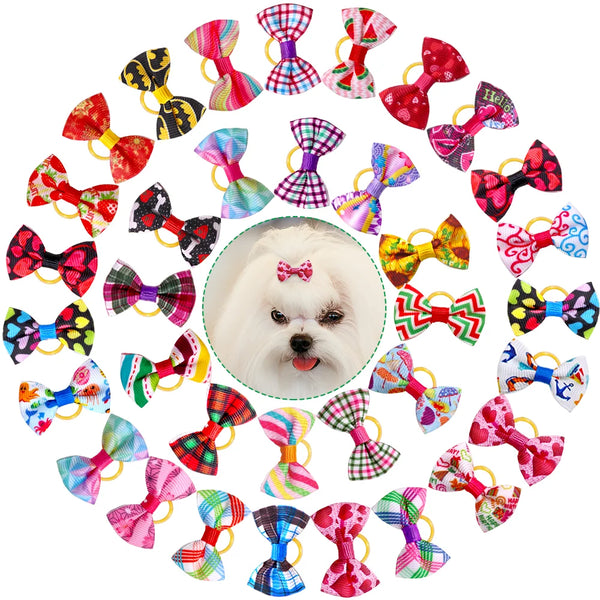 A collection of colorful pet hair bows in various patterns and colors attached with gentle rubber bands.