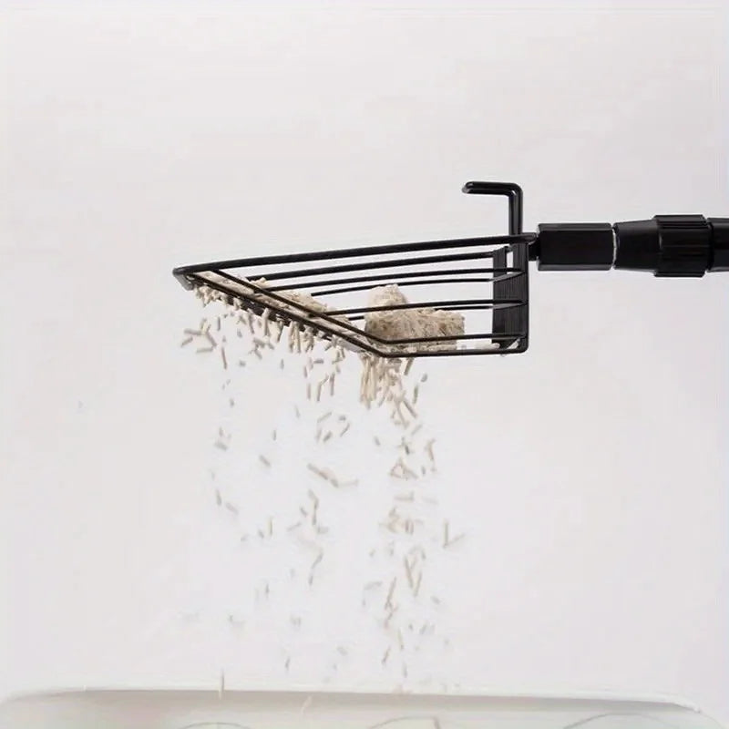 A black stretchable stainless steel scoop is shown tilting and spilling small debris, likely for cleaning animal habitats.