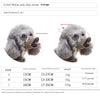 A pair of soft silicone dog muzzles in gray, shown with measurements for small to medium dogs.