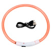 Orange flexible LED dog collar with a white charging module and USB connector.