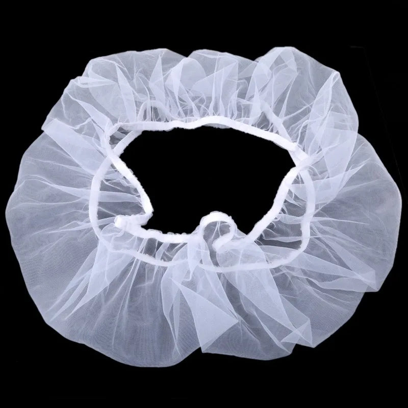 White nylon mesh skirt designed as a debris guard for a bird cage seed catcher.