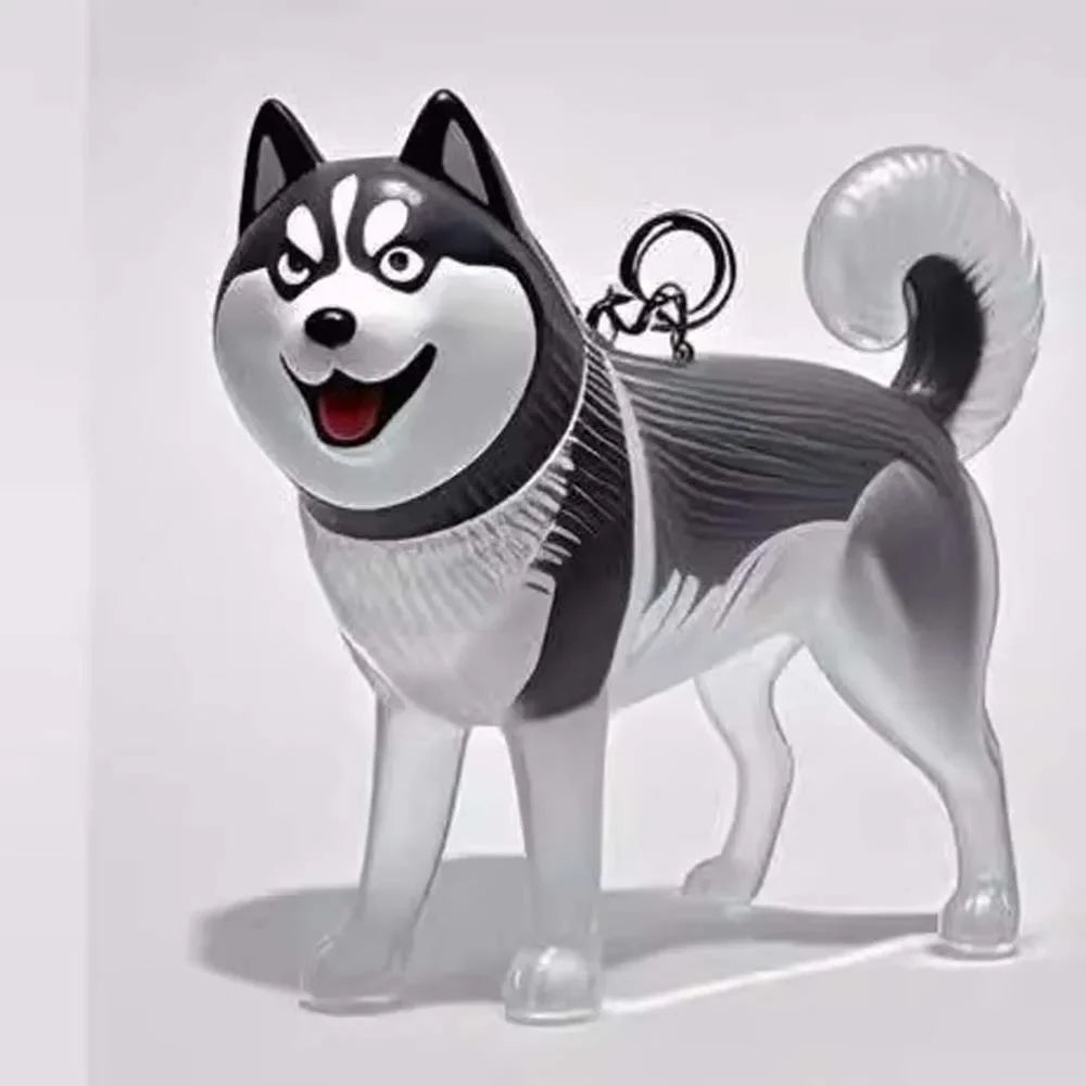 Figura de perro de cartón plateado y negro con cola esponjosa, diseñada como llavero para guardar cabello.