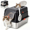 A stainless steel litter box for cats with a cat looking out of the opening.
