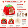 A red strawberry shaped pet bed for small animals with an entrance and soft interior