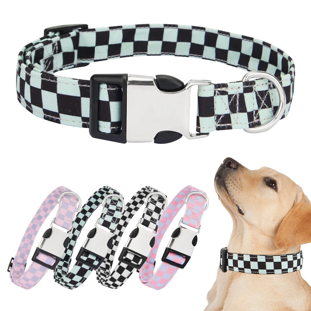 A beige dog wearing an adjustable checker pattern nylon collar with pink and black accents.