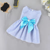 A light blue and white striped summer bow dress for a small pet, featuring a satin blue bow detail.