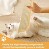 A white cat is using an interactive scratcher toy designed to satisfy the high-intensity usage needs of cats.