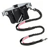 A black hands-free reflective dog leash with a storage bag and adjustable collar.