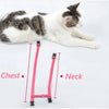 A tabby and white cat lying down next to a pink adjustable nylon pet harness, showing measurements for the chest and neck.