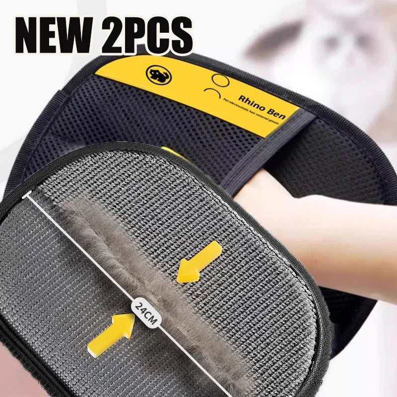 A pair of black pet grooming gloves with a gray textured pad and yellow accents shown in close-up.