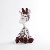 A white and brown plush dog toy with large ears, designed for chewing and interactive play.