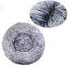 A circular close-up of a fluffy gray pet bed for dogs and cats.