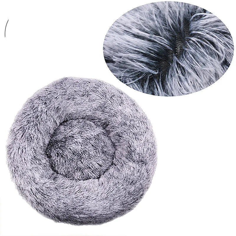 A circular close-up of a fluffy gray pet bed for dogs and cats.