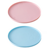A pink silicone pet feeding mat for dogs and cats shown in two colors, pink and light blue.
