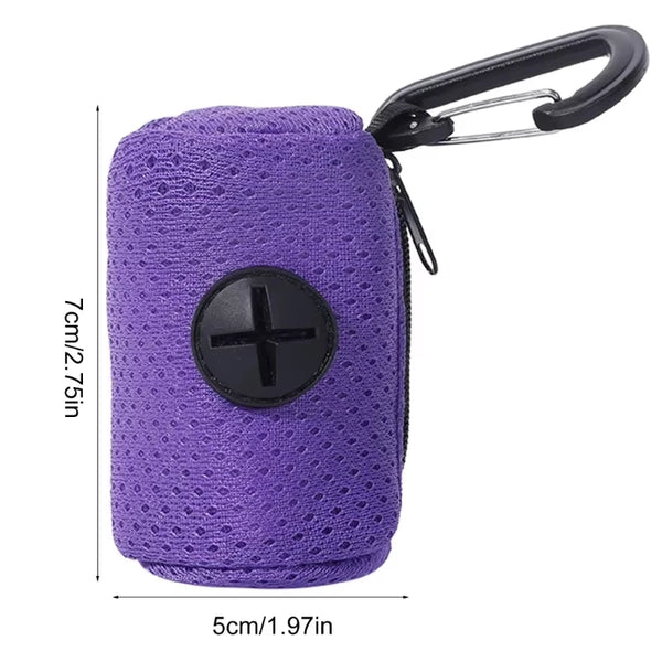 Purple reusable dog poop bags with a black cross emblem and a metal clip.