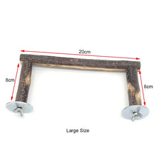 A natural wood pet perch or chew toy with a rectangular shape and metal attachments.