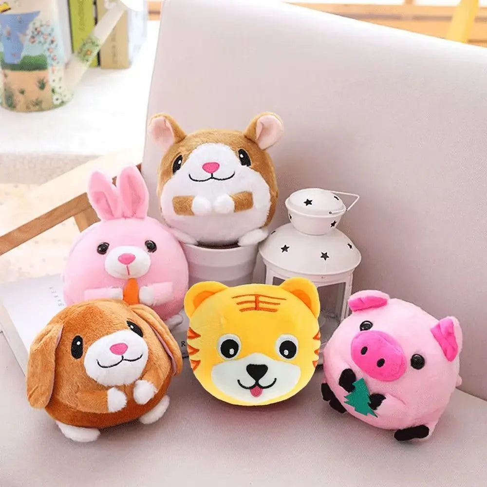 A collection of soft plush toys including a cat, a rabbit, a dog, and a tiger, displayed on a white surface.
