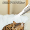 A tabby cat is resting on white bedding near a grooming trimmer, demonstrating low-frequency operation for pet care.