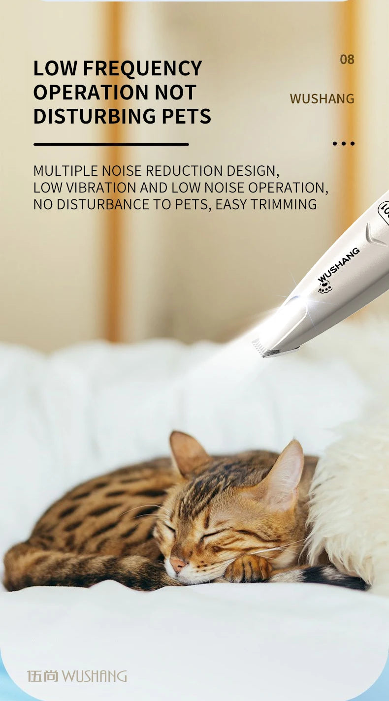 A tabby cat is resting on white bedding near a grooming trimmer, demonstrating low-frequency operation for pet care.