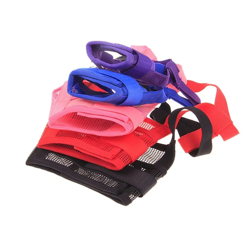 A collection of colorful adjustable breathable dog muzzles with soft padding in purple, blue, pink, and red.