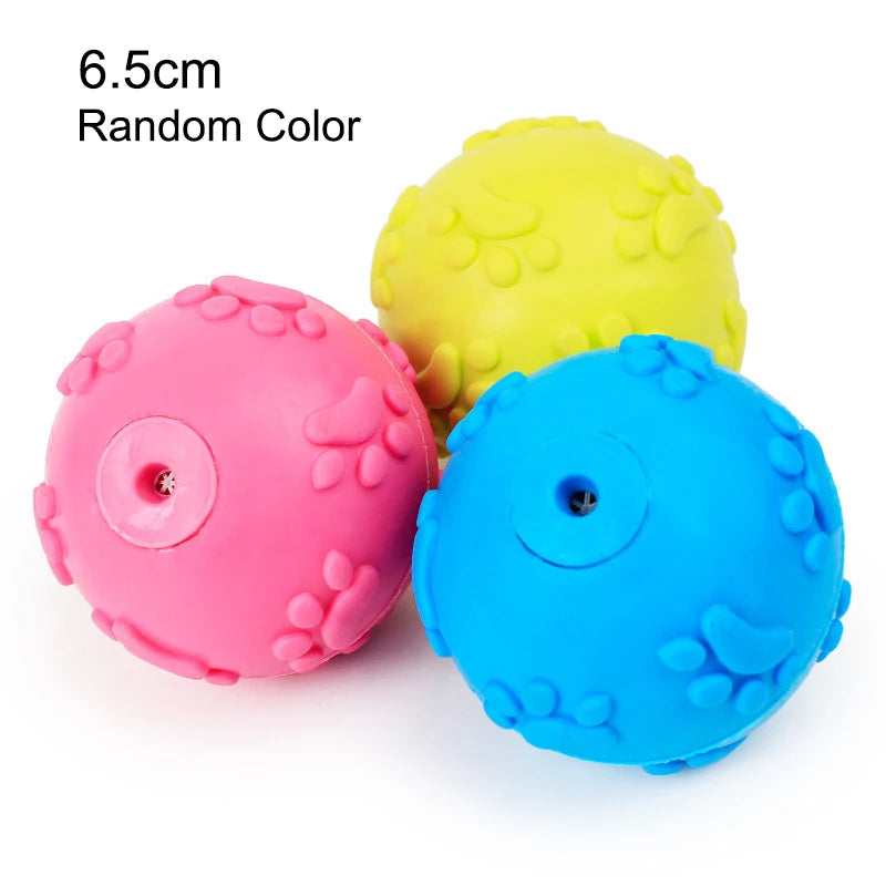 Three squeaky chew toys for dogs in pink, yellow, and blue colors