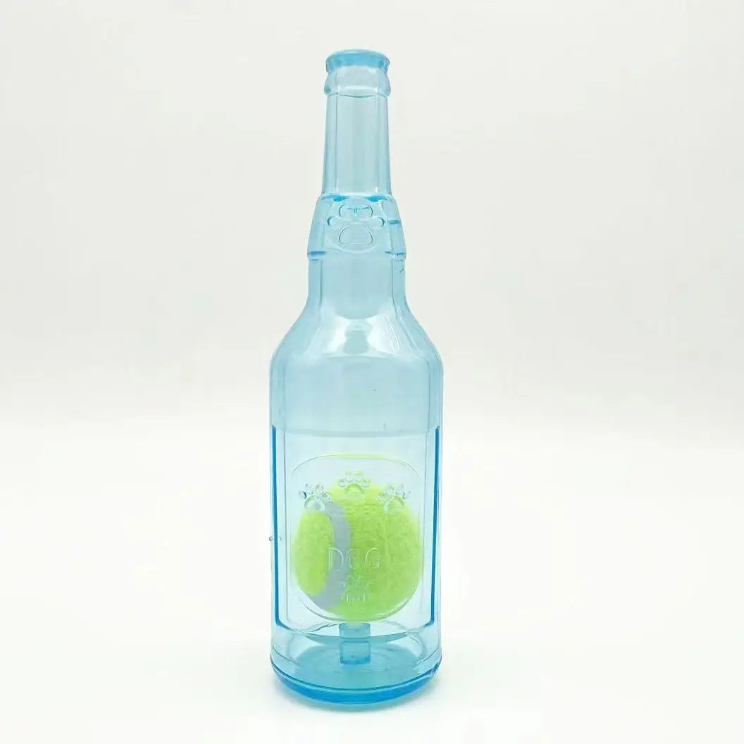 A clear blue plastic bottle filled with liquid, featuring a tennis ball chew toy visible at the bottom.
