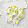 White reusable dog physiological pants with yellow floral print and a light yellow bow