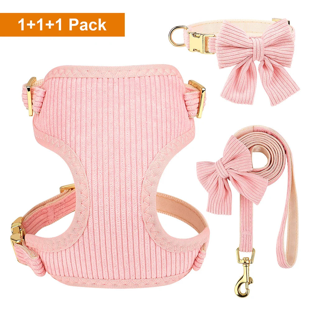 A pink 1+1+1 pack of breathable dog harness, collar, and leash set with a bowknot.