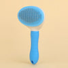 A light blue pet hair removal brush with a white head and blue handle against a beige background.