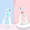 A white professional pet nail clipper with a light blue LED feature shown against a pink background.