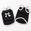 Black pet vest with white trim and a decorative bow knot for small dogs and cats