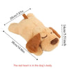 A light tan plush comfort toy shaped like a dog's head with a red heart detail.