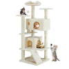 A light beige cat tree tower with multiple levels, condos, and sisal scratching posts, featuring a small kitten on top.