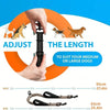 Hands adjust the length of a dual dog leash coupler with padded handles and bungee to suit medium or large dogs.