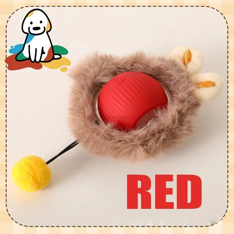 A red automatic rolling interactive ball for cats with a fuzzy outer layer and a yellow ball.