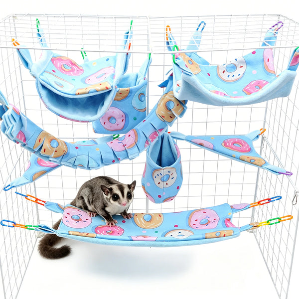 A multi-functional pet hammock and hideout set featuring colorful fabric hammocks for small pets inside a wire cage.