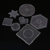 A collection of precision hama beads shapes and a tweezers kit laid out on a black background.