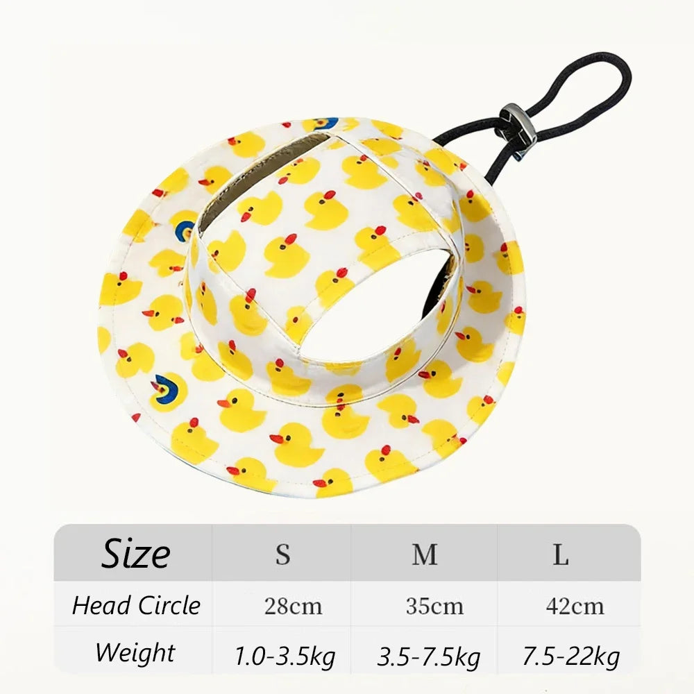Yellow duck print pet cap for dogs with a black strap