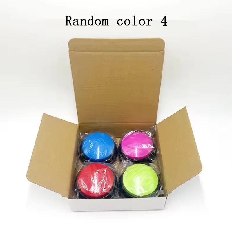 A cardboard box containing four colorful pet communication buttons for dog training.