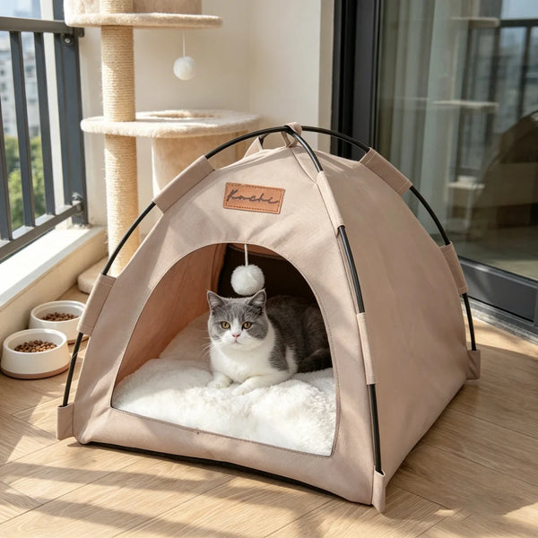A beige breathable foldable pet nest tent with a semi-enclosed shelter for a cat sitting inside.